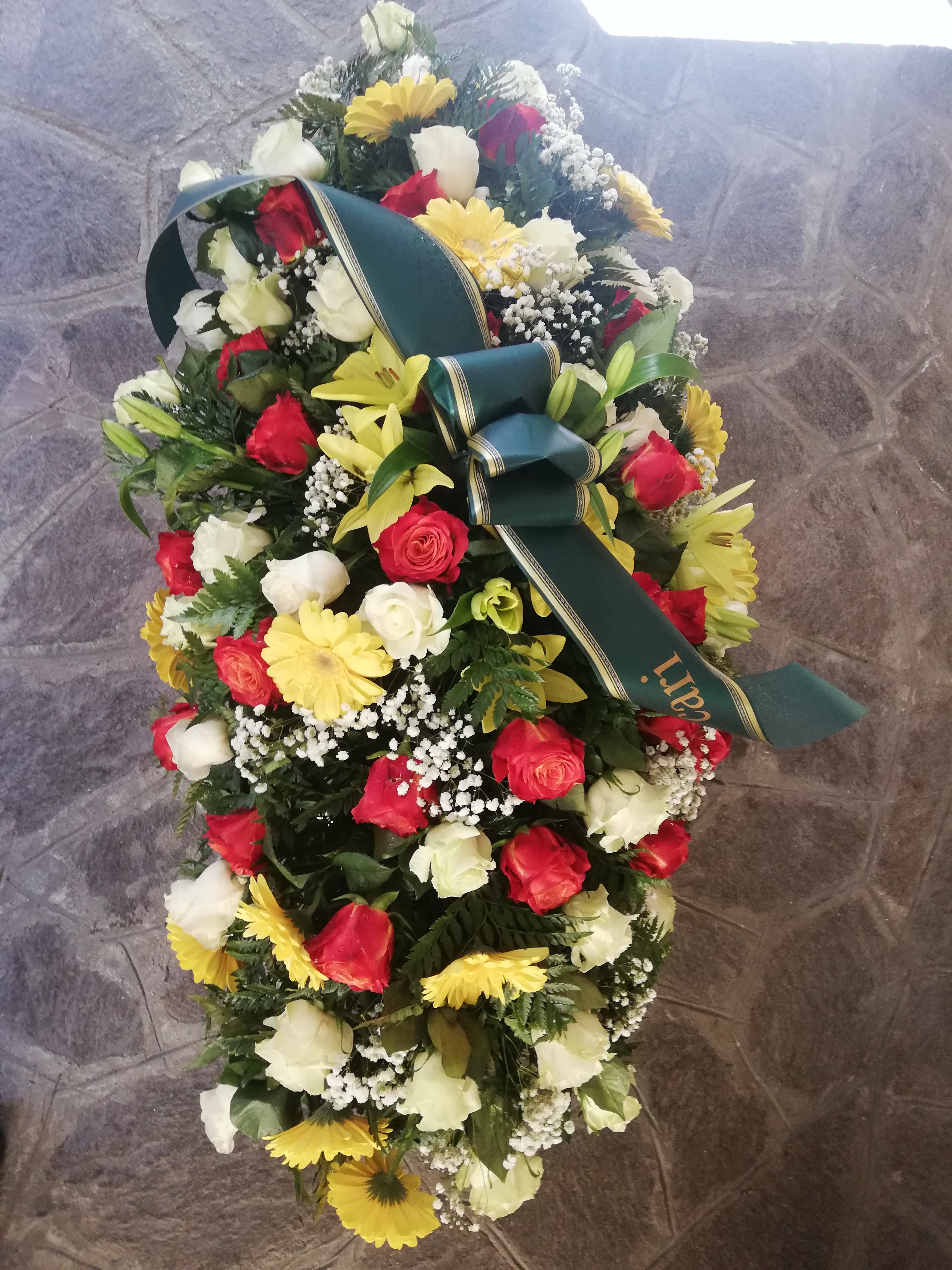 Copricassa Funebre Rose e Gerbere Fioreria Bruseghini Besenello Trento